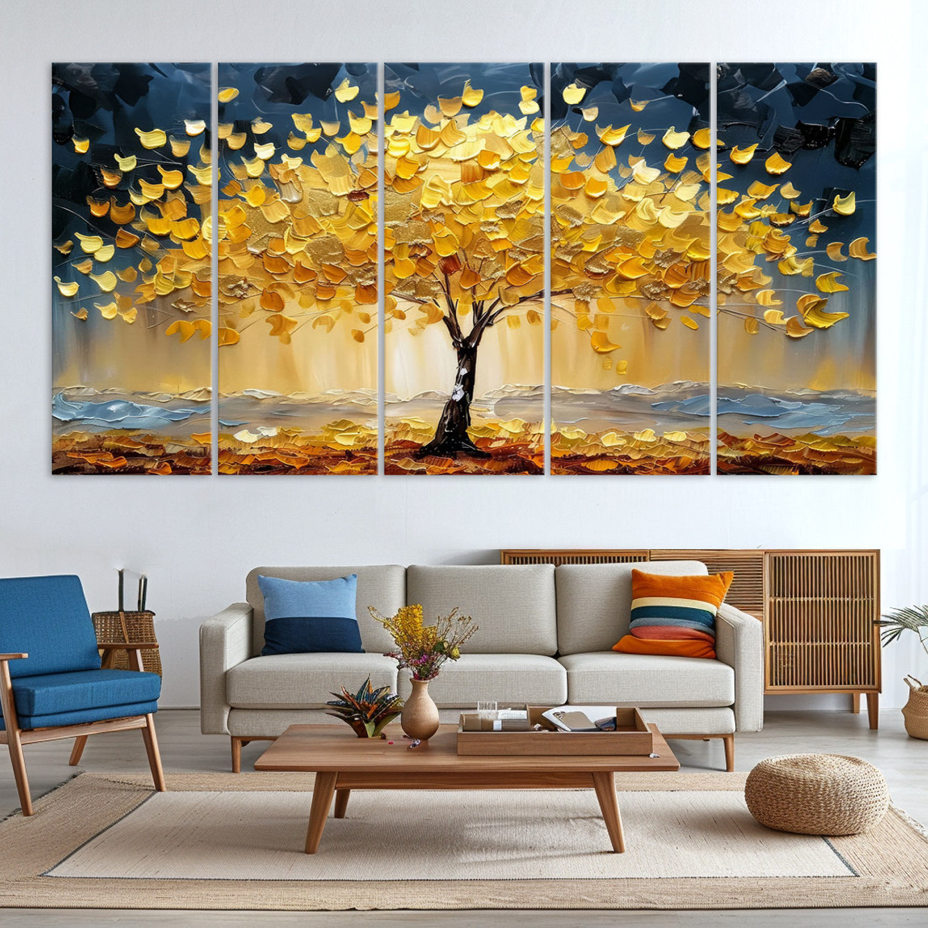 Canvas of a golden autumn tree with textured brushstrokes and moody blue skies, perfect for dramatic and vibrant home decor.