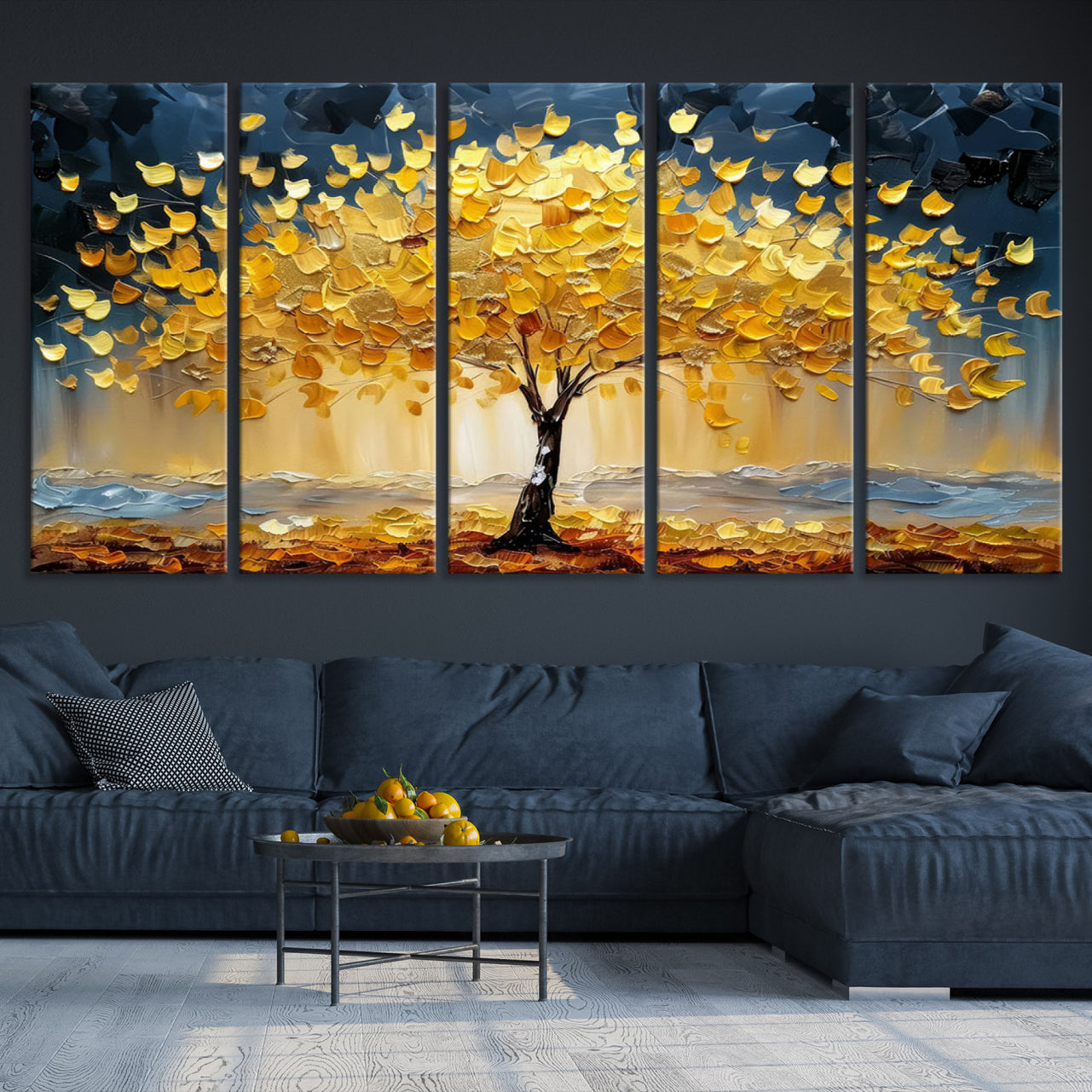 Canvas of a golden autumn tree with textured brushstrokes and moody blue skies, perfect for dramatic and vibrant home decor.