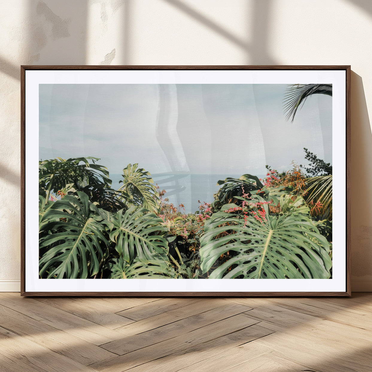 45700479-MGV-CV-36X24 - Tropical Greenery Wall Art – Exotic Leaves & Ocean View Canvas Print, Sunlit Paradise and Vibrant Nature for Living Room or Coastal Decor
