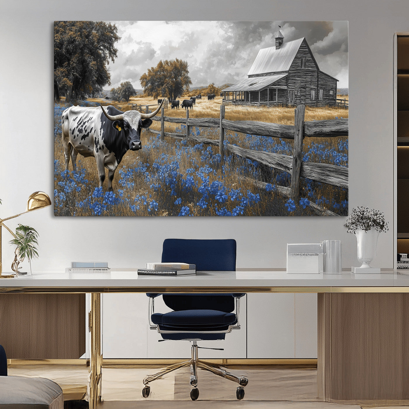 A Texas longhorn stands in front of a rustic barn and wooden fence, with bluebonnets and grazing cattle under dramatic skies.