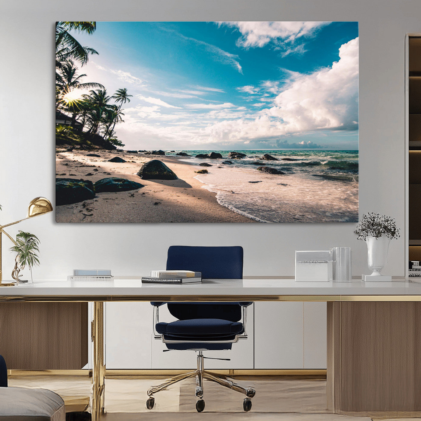 Scenic tropical beach with palm trees, ocean waves, and rocky shoreline under a bright blue sky, creating a serene coastal vibe.