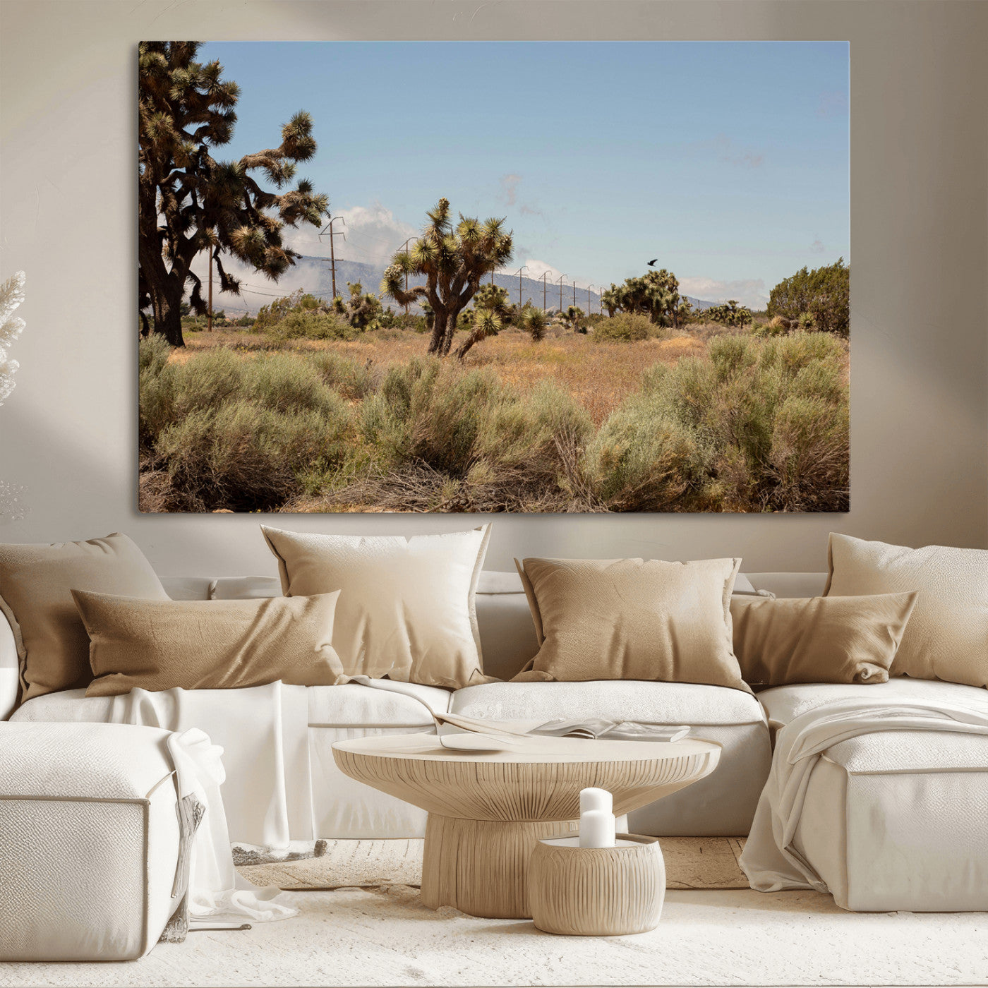 Scenic desert landscape with Joshua trees, dry grass, and distant mountains under a clear blue sky, perfect for southwestern and rustic decor.