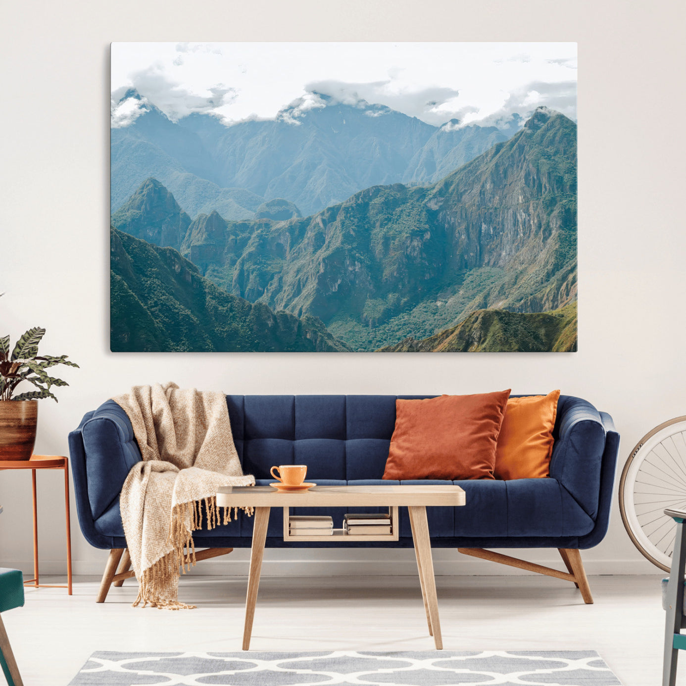 A misty mountain landscape with cloud-covered Andean peaks and lush green valleys, creating a dramatic and serene view, perfect for rustic or nature-inspired home decor.