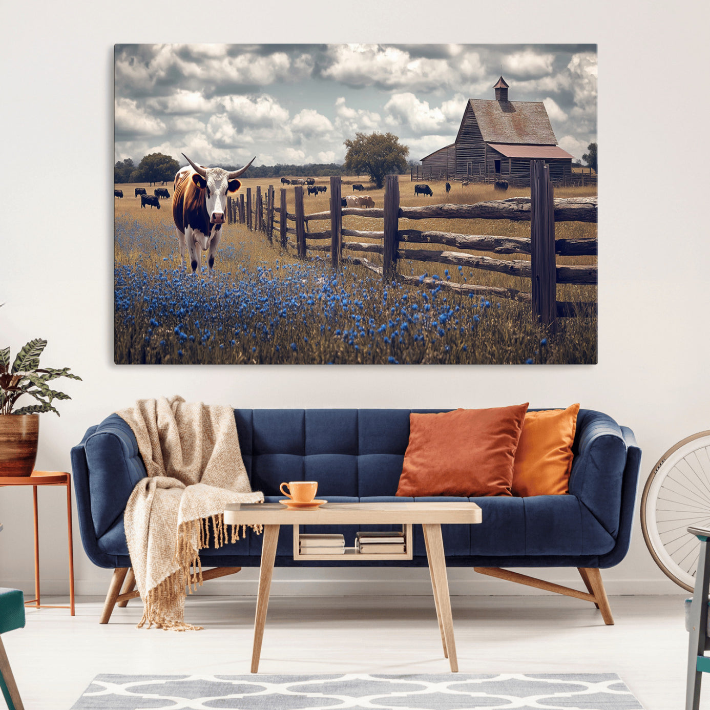Framed canvas print of a Texas Longhorn near a rustic barn and fence, ideal for farmhouse or western-style home wall decor.
