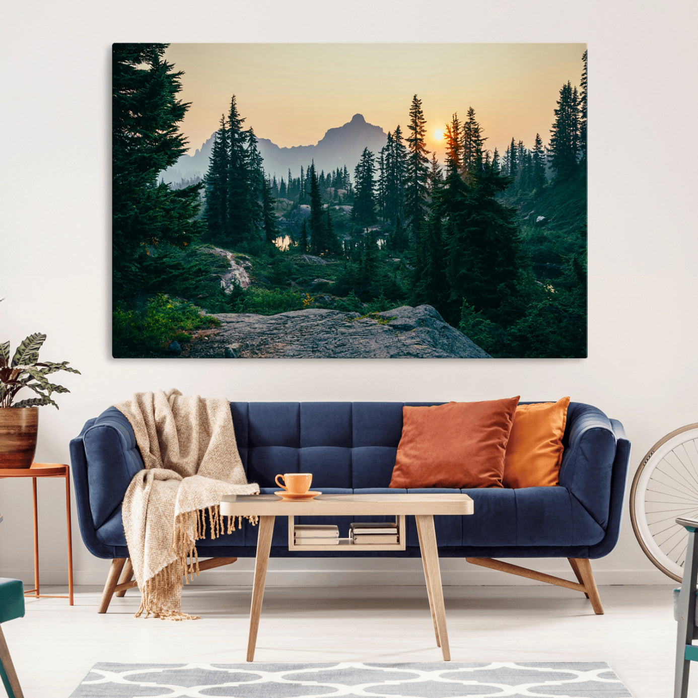 Mountain landscape with evergreen trees at sunset, casting a golden glow over the wilderness, creating a peaceful and rustic nature scene.