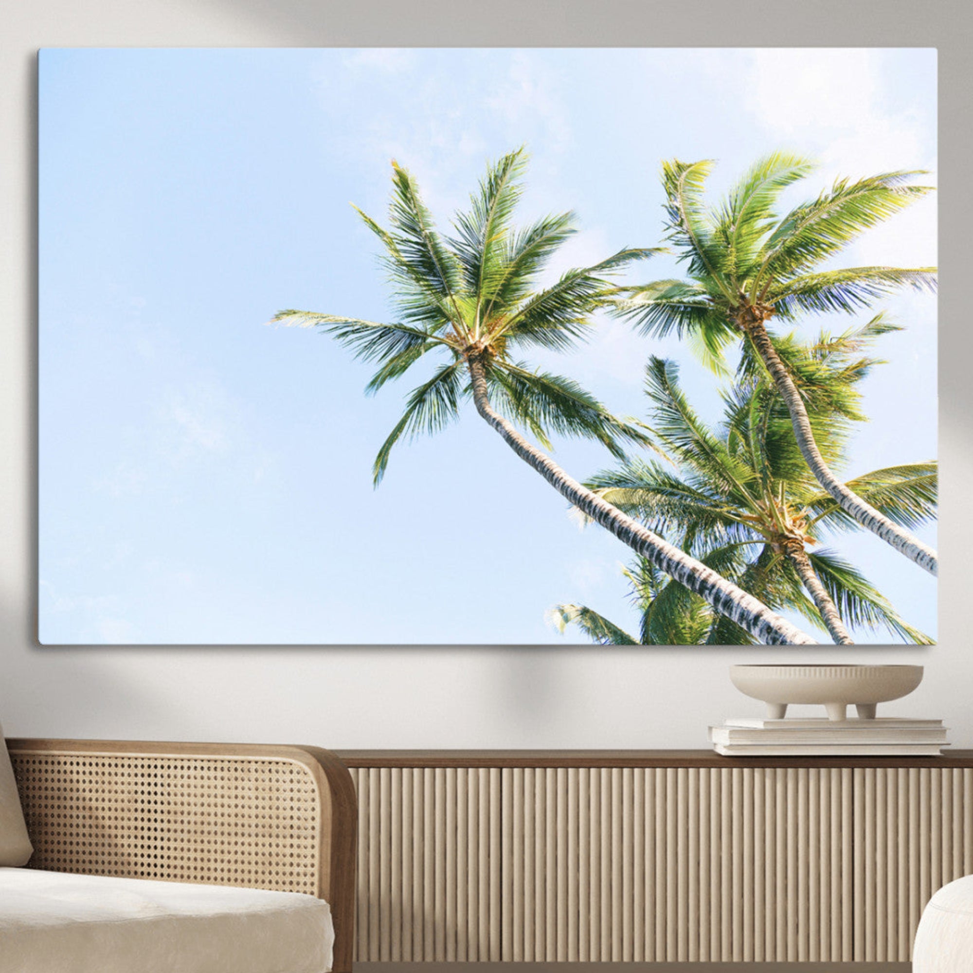 Tall palm trees swaying under a bright blue sky, capturing a tropical and minimalist beach vibe, perfect for coastal-inspired wall art.
