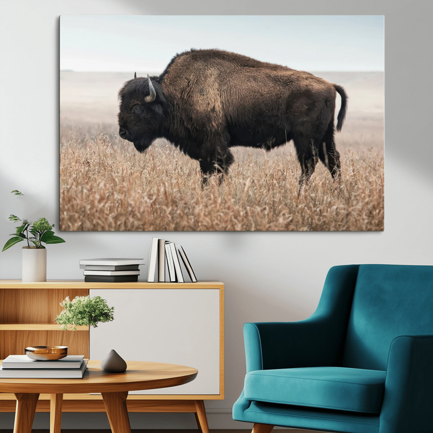 A lone bison stands in a vast prairie under a soft sky, evoking freedom and rustic charm for western or farmhouse inspired interiors.