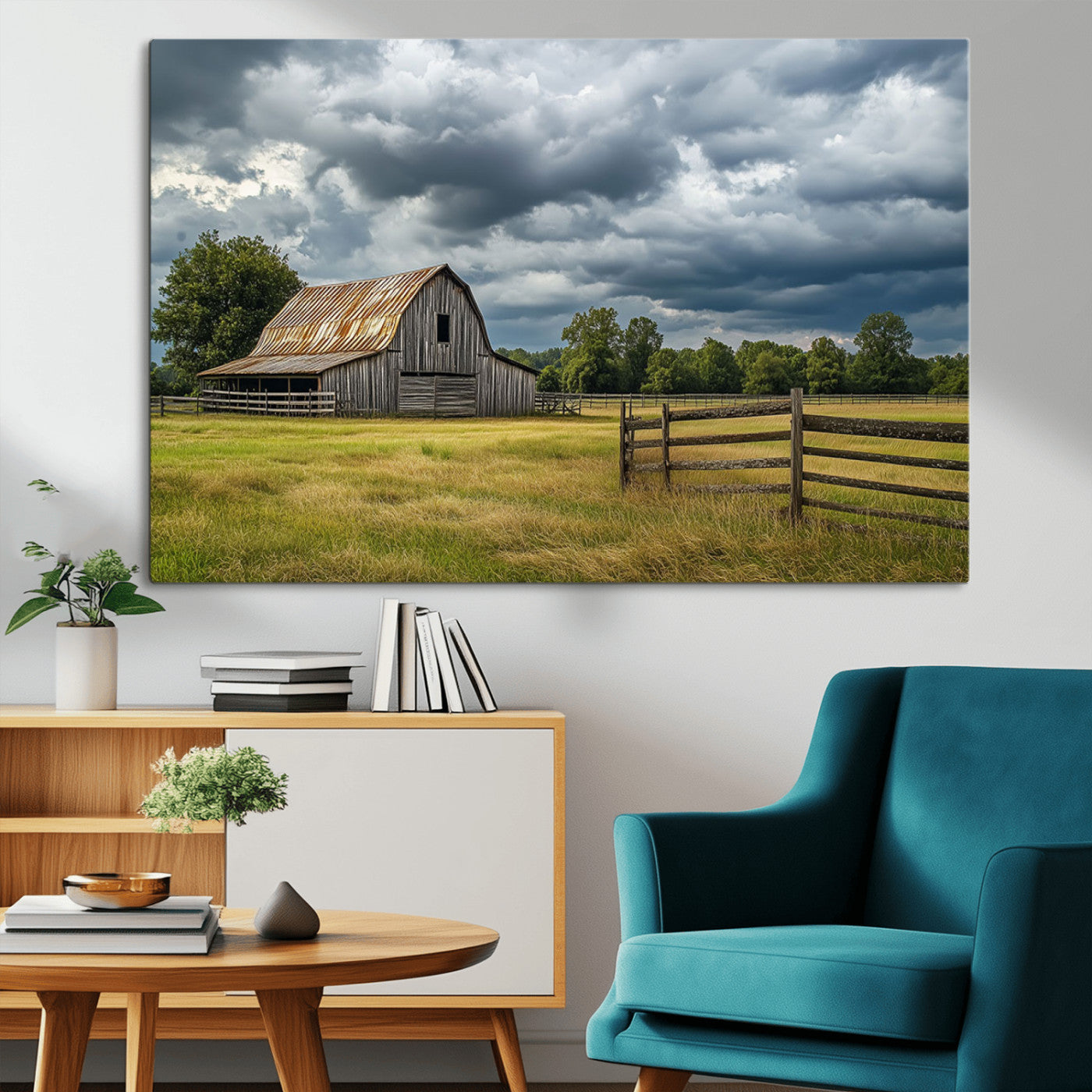 "Rustic barn in a wide open field under a dramatic sky with dark clouds, surrounded by a wooden fence and lush green trees."