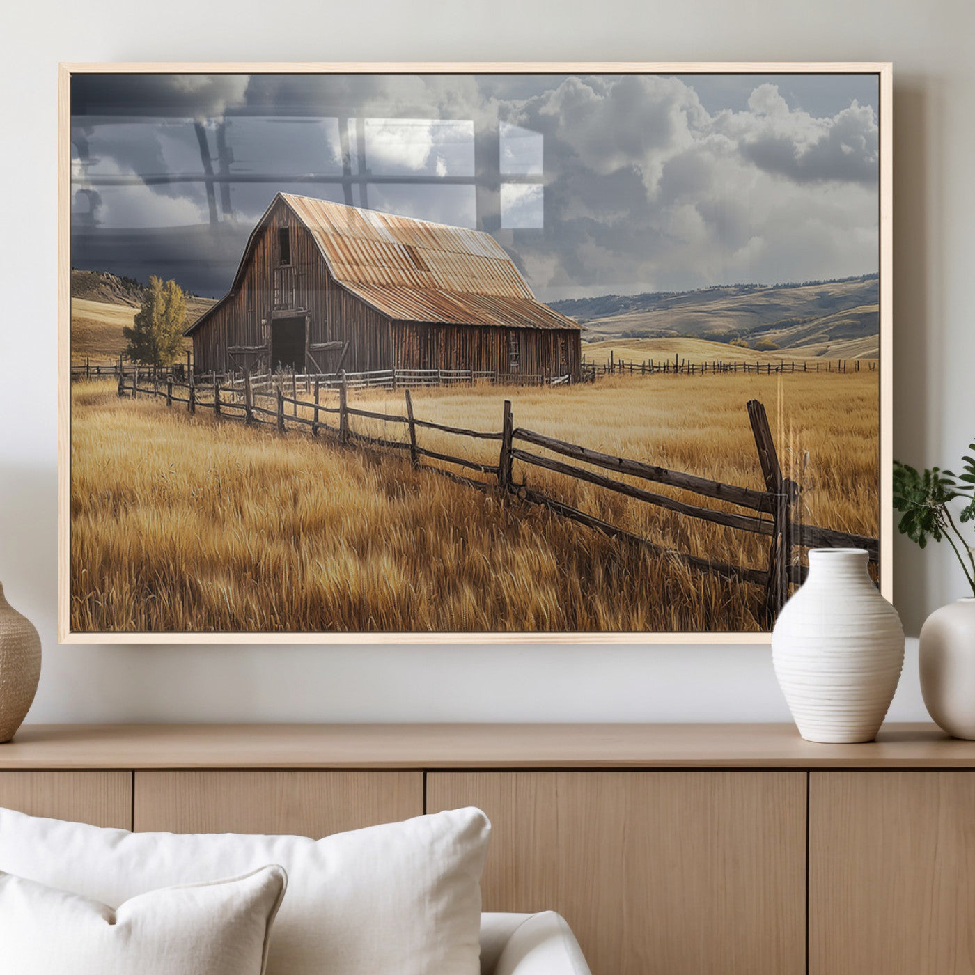 "Rustic barn surrounded by golden fields, a wooden fence, and dramatic storm clouds in the sky, capturing a serene countryside landscape."