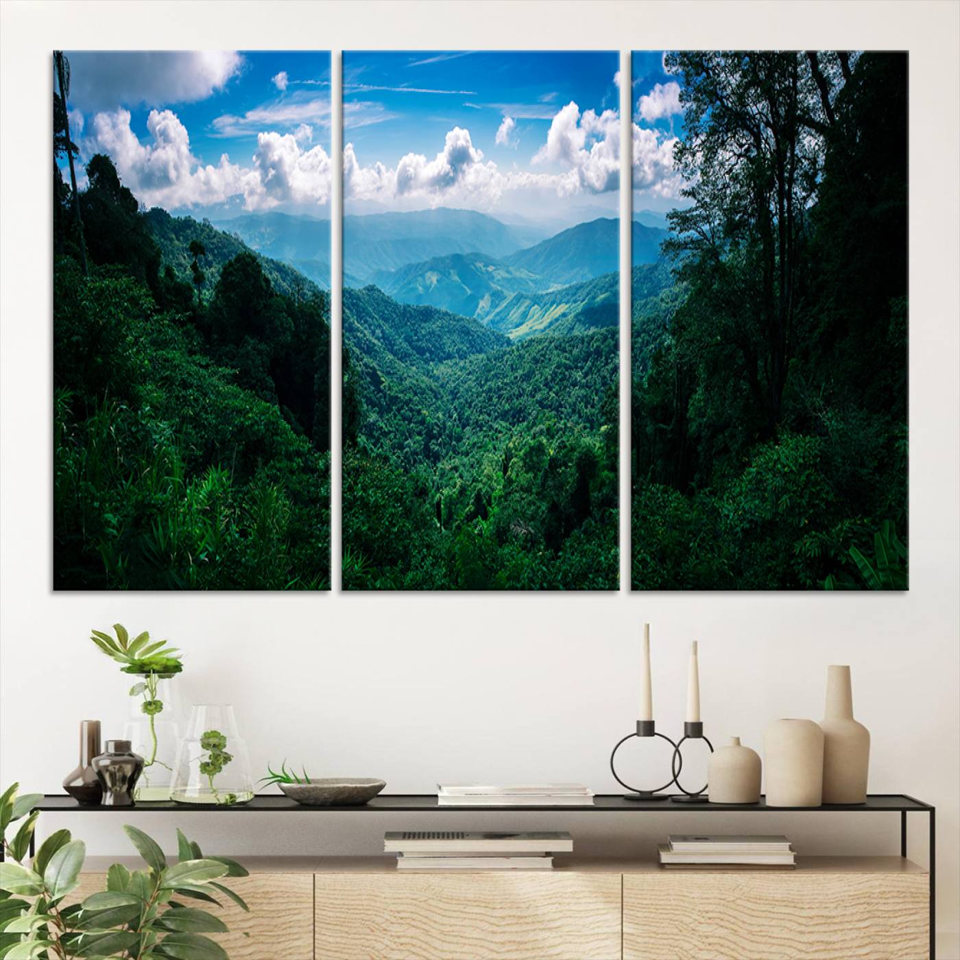 Canvas of a misty tropical jungle with vibrant greenery and layered blue mountains, ideal for exotic nature-themed wall décor.