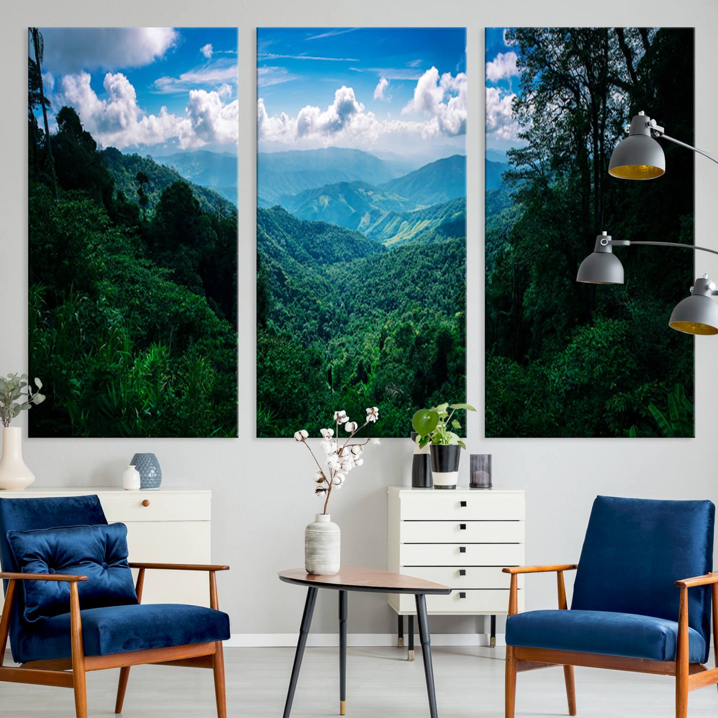 Canvas of a misty tropical jungle with vibrant greenery and layered blue mountains, ideal for exotic nature-themed wall décor.