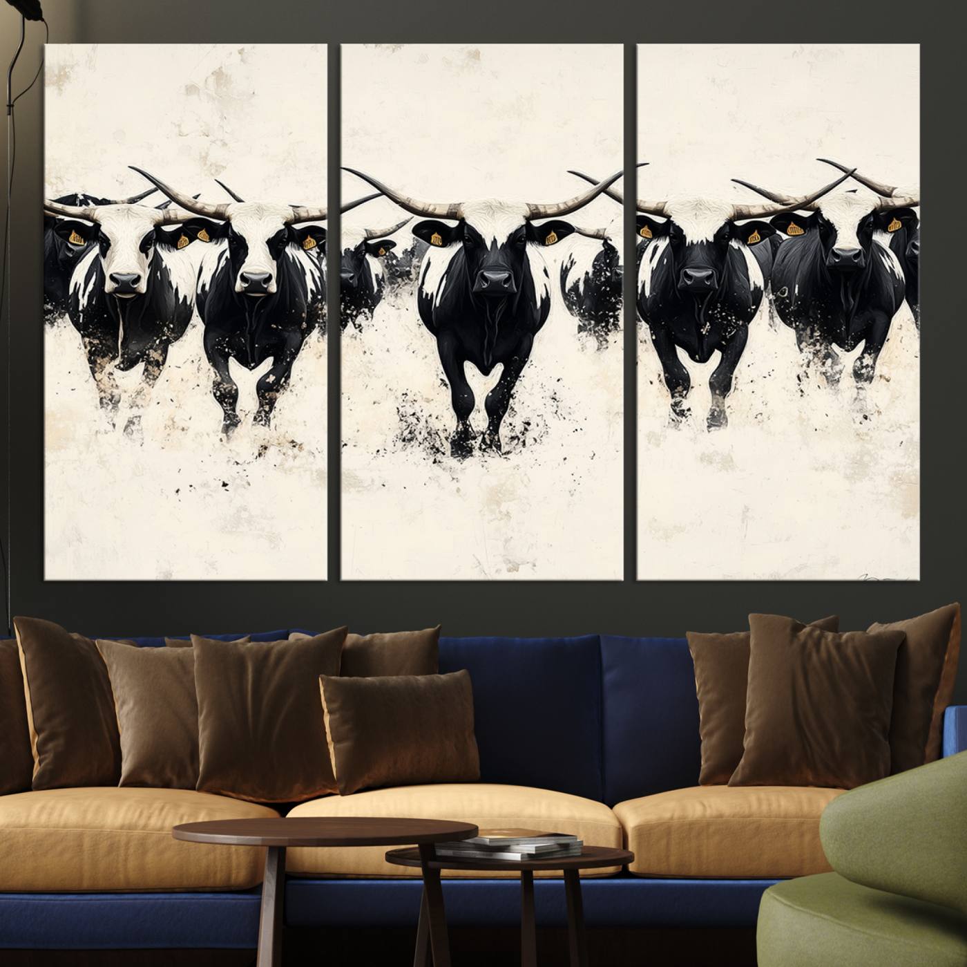 Canvas artwork of black and white Texas longhorns in a bold stampede over a minimalist background, ideal for rustic modern or Western-themed decor.