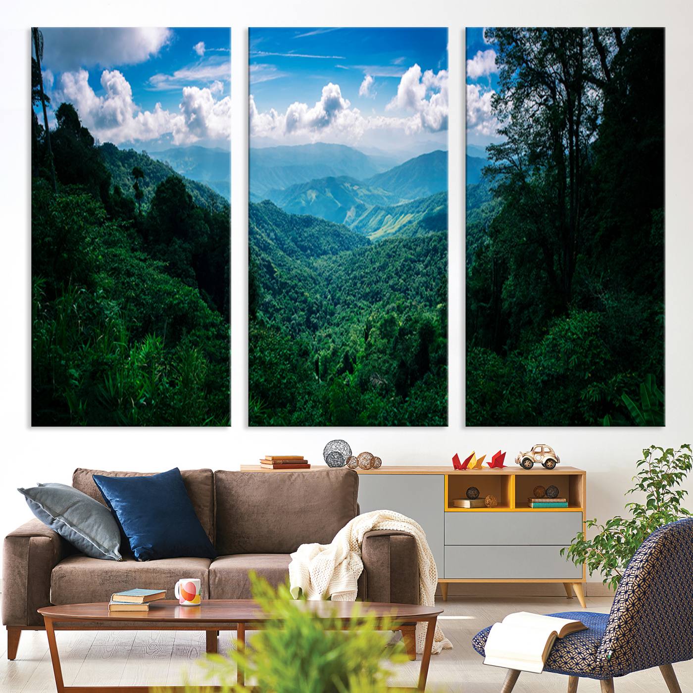 Canvas of a misty tropical jungle with vibrant greenery and layered blue mountains, ideal for exotic nature-themed wall décor.