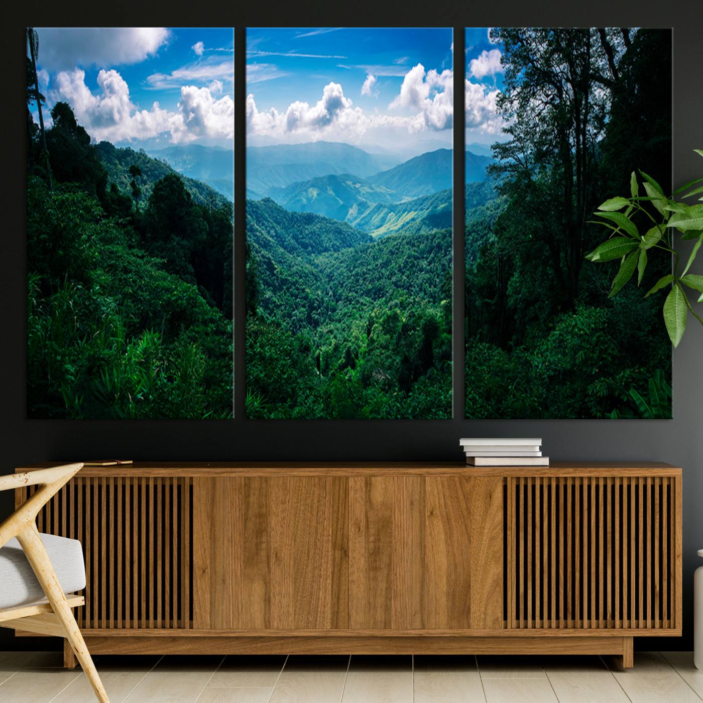 Canvas of a misty tropical jungle with vibrant greenery and layered blue mountains, ideal for exotic nature-themed wall décor.