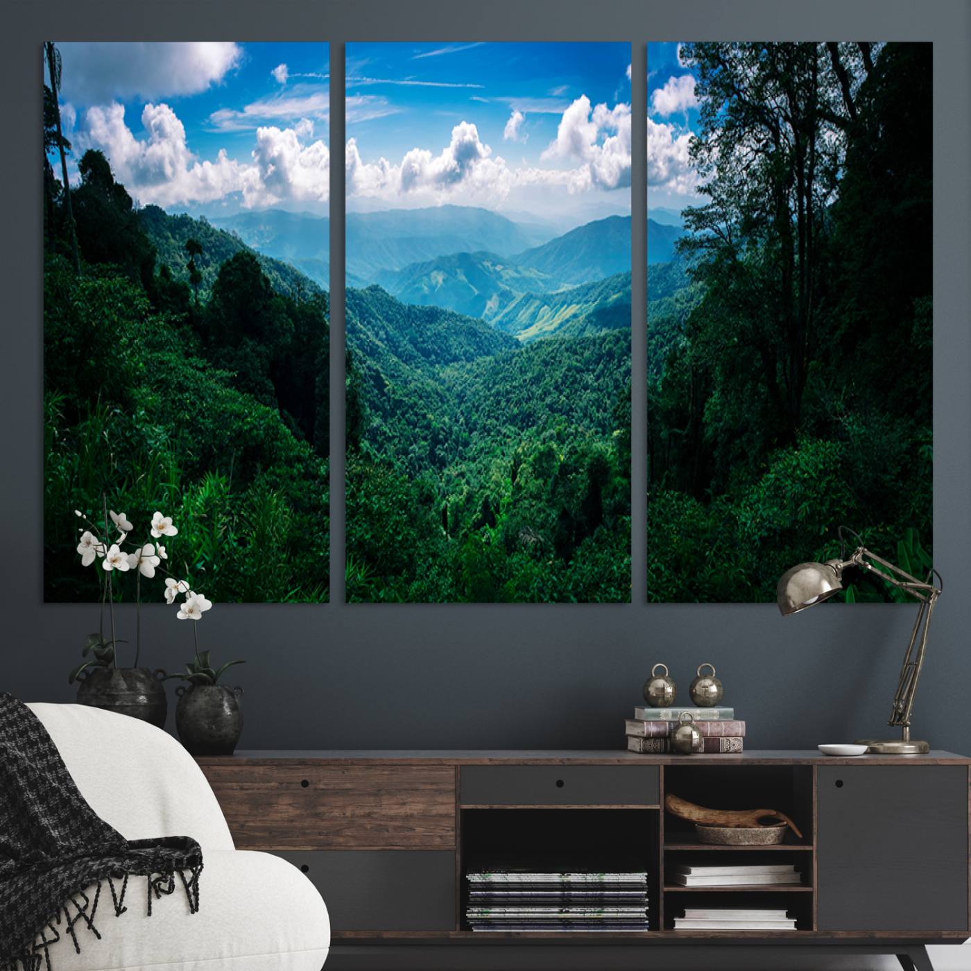 Canvas of a misty tropical jungle with vibrant greenery and layered blue mountains, ideal for exotic nature-themed wall décor.