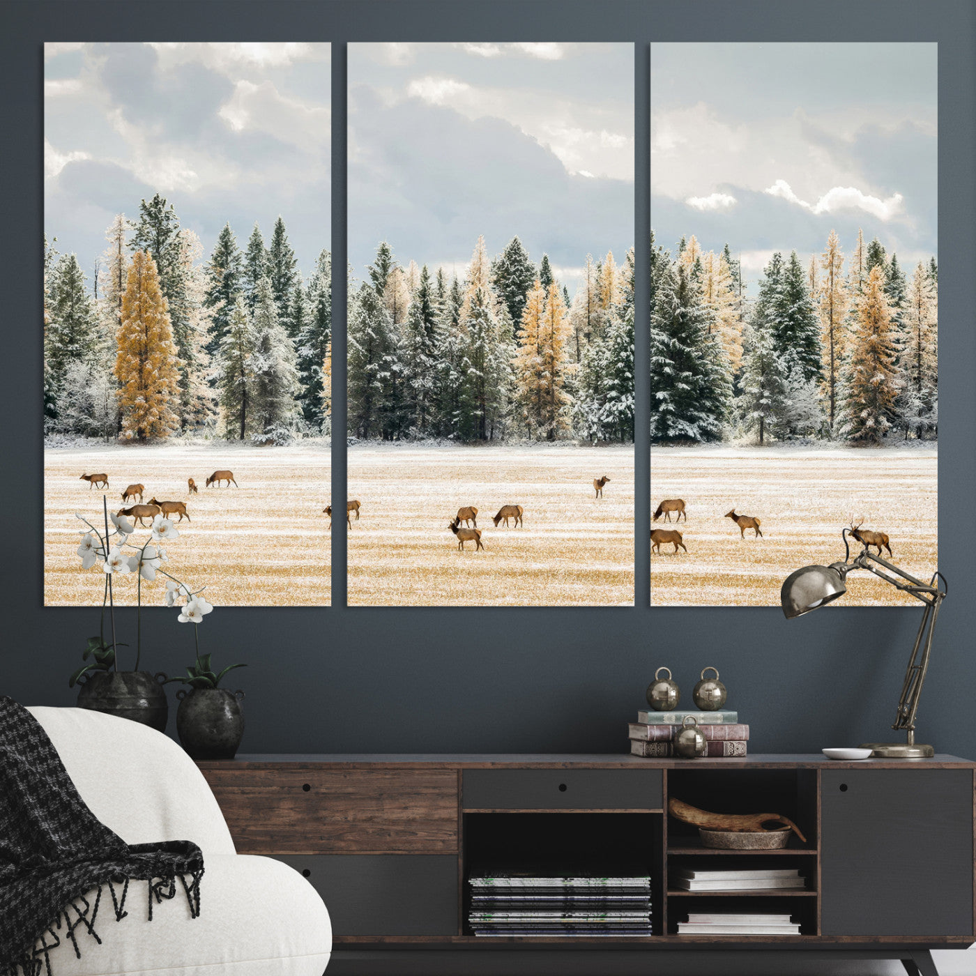 Elk herd in a snowy field with golden pine trees and frosted evergreens, ideal for neutral rustic or cabin-style home decor.