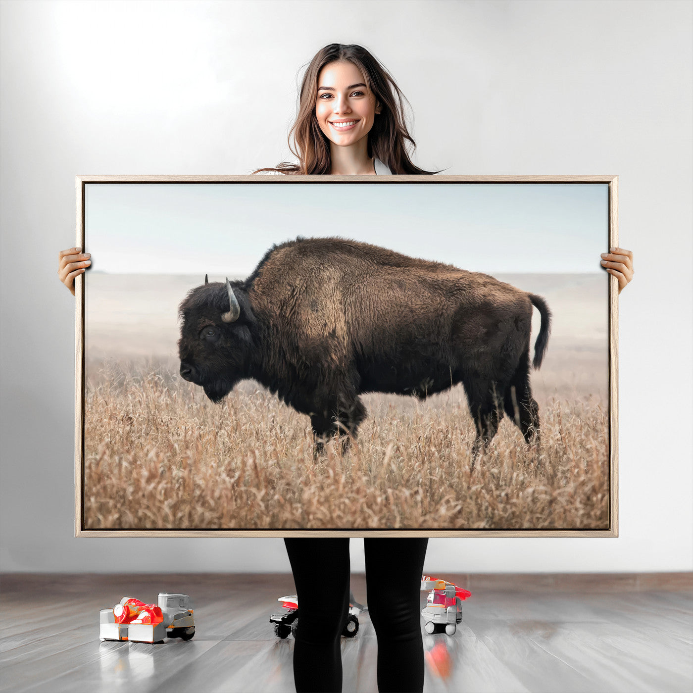 A lone bison stands in a vast prairie under a soft sky, evoking freedom and rustic charm for western or farmhouse inspired interiors.