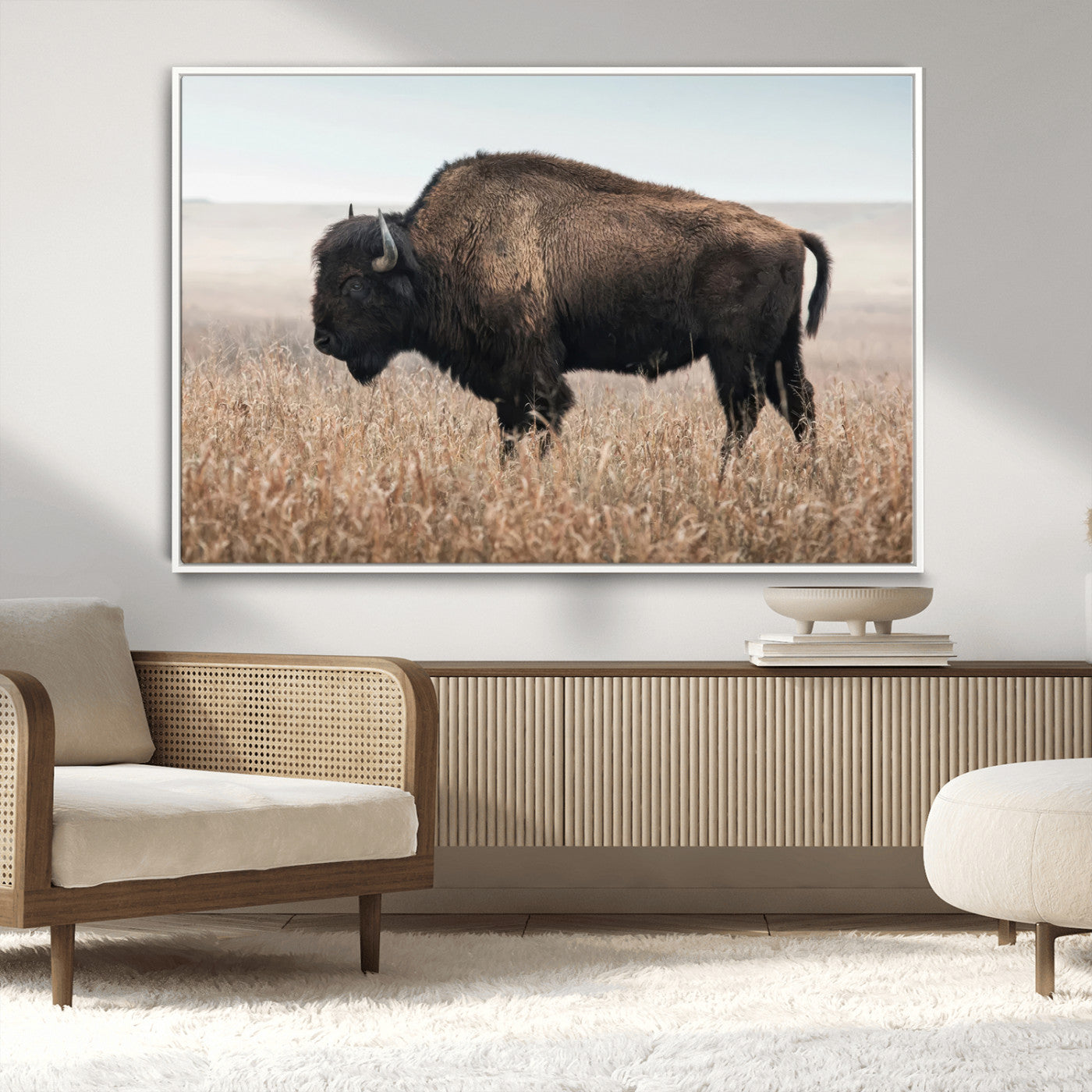 A lone bison stands in a vast prairie under a soft sky, evoking freedom and rustic charm for western or farmhouse inspired interiors.