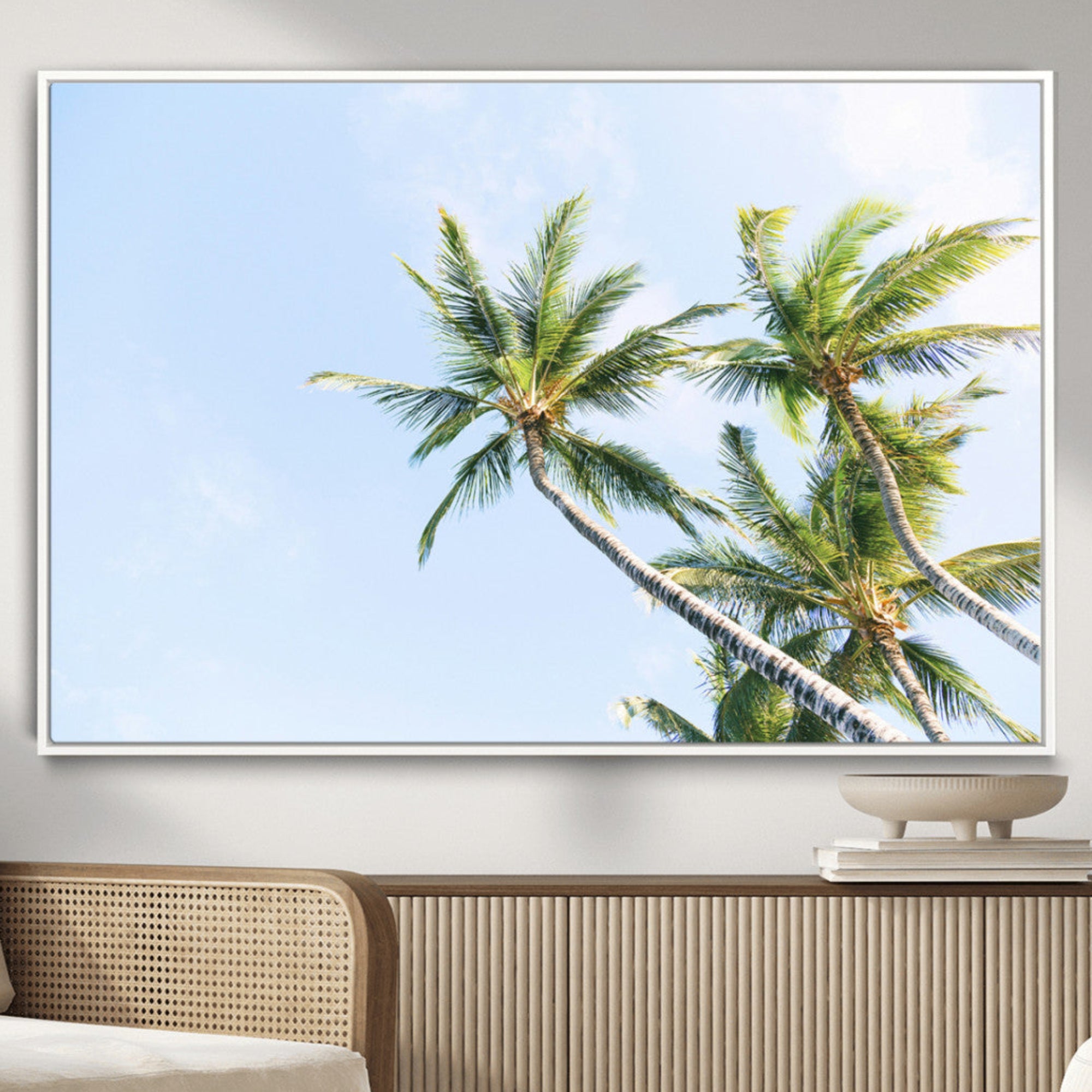 Tall palm trees swaying under a bright blue sky, capturing a tropical and minimalist beach vibe, perfect for coastal-inspired wall art.