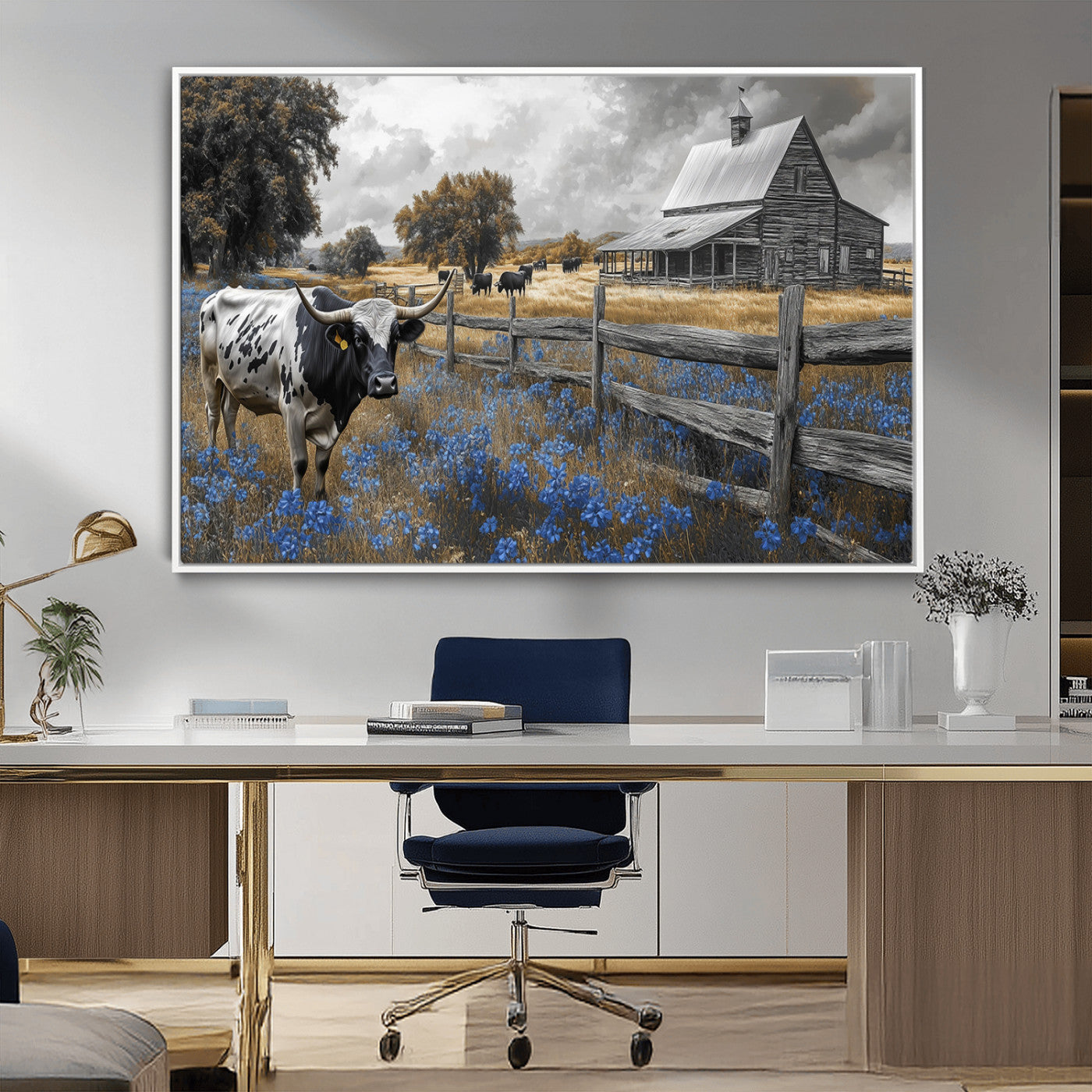 A Texas longhorn stands in front of a rustic barn and wooden fence, with bluebonnets and grazing cattle under dramatic skies.