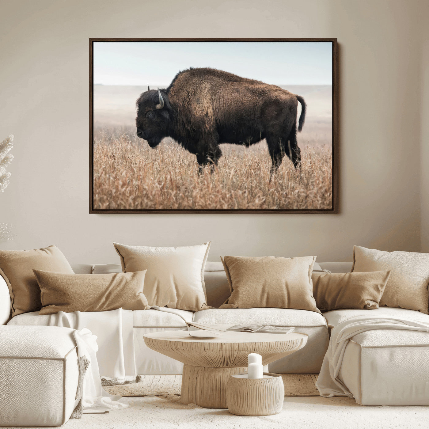 A lone bison stands in a vast prairie under a soft sky, evoking freedom and rustic charm for western or farmhouse inspired interiors.