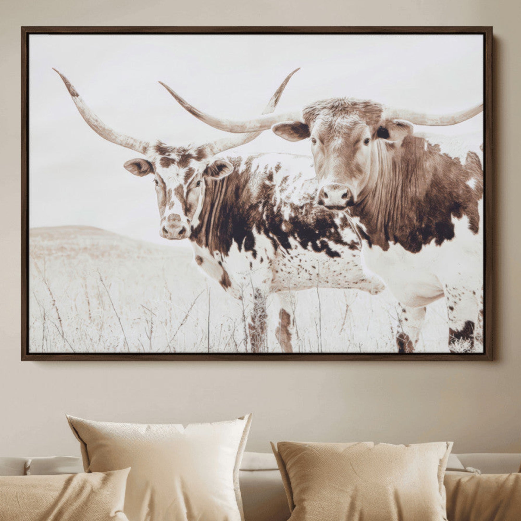Two longhorn cows standing in a sepia-toned pasture with soft light, ideal for rustic or farmhouse-themed neutral wall decor.