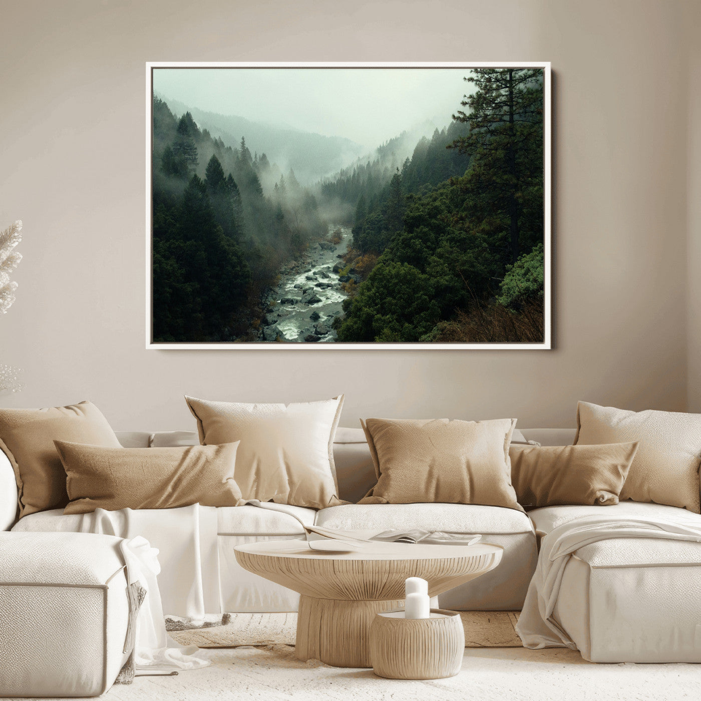 Misty forest with a winding river flowing through lush green mountains, creating a tranquil and moody wilderness landscape.