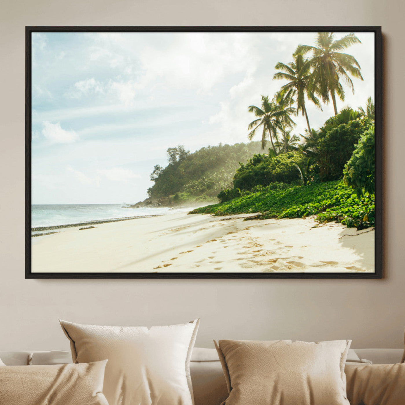 A tropical beach with palm trees, soft sand, and ocean waves under a bright sky, creating a peaceful and relaxing coastal view.