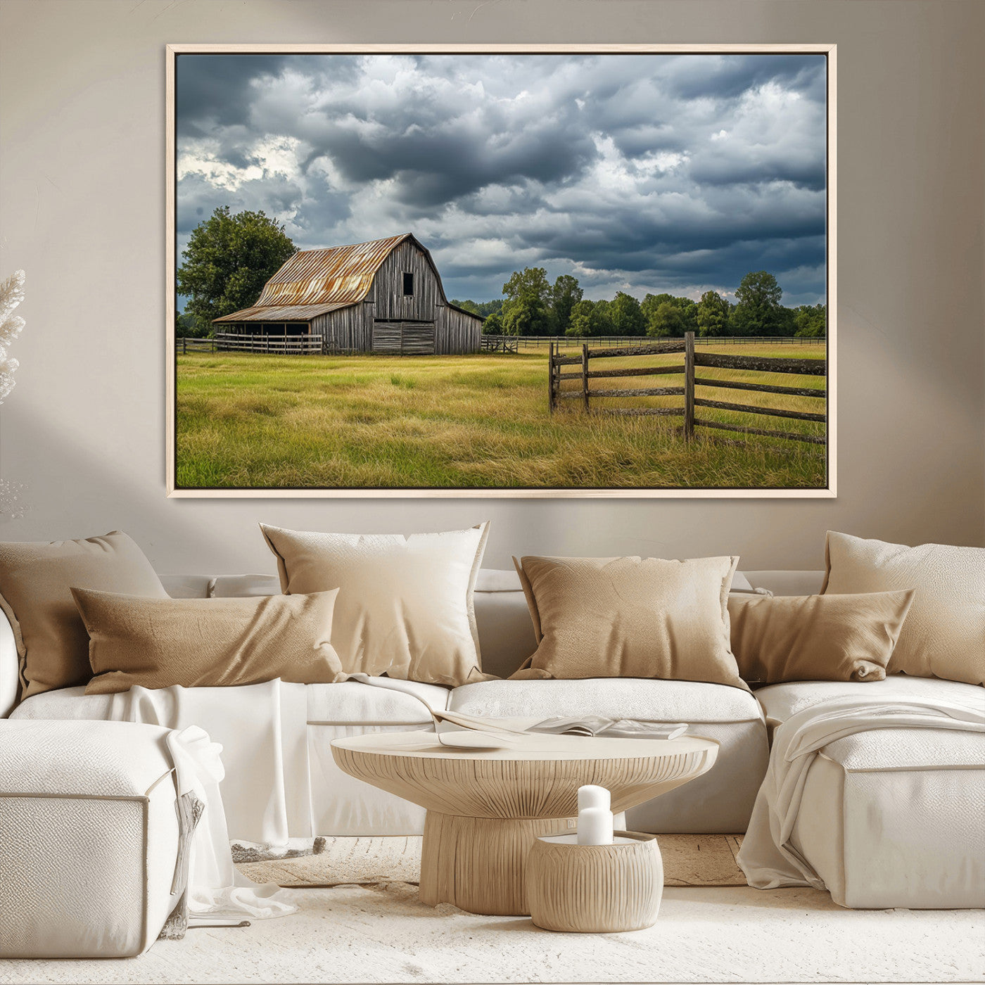 "Rustic barn in a wide open field under a dramatic sky with dark clouds, surrounded by a wooden fence and lush green trees."