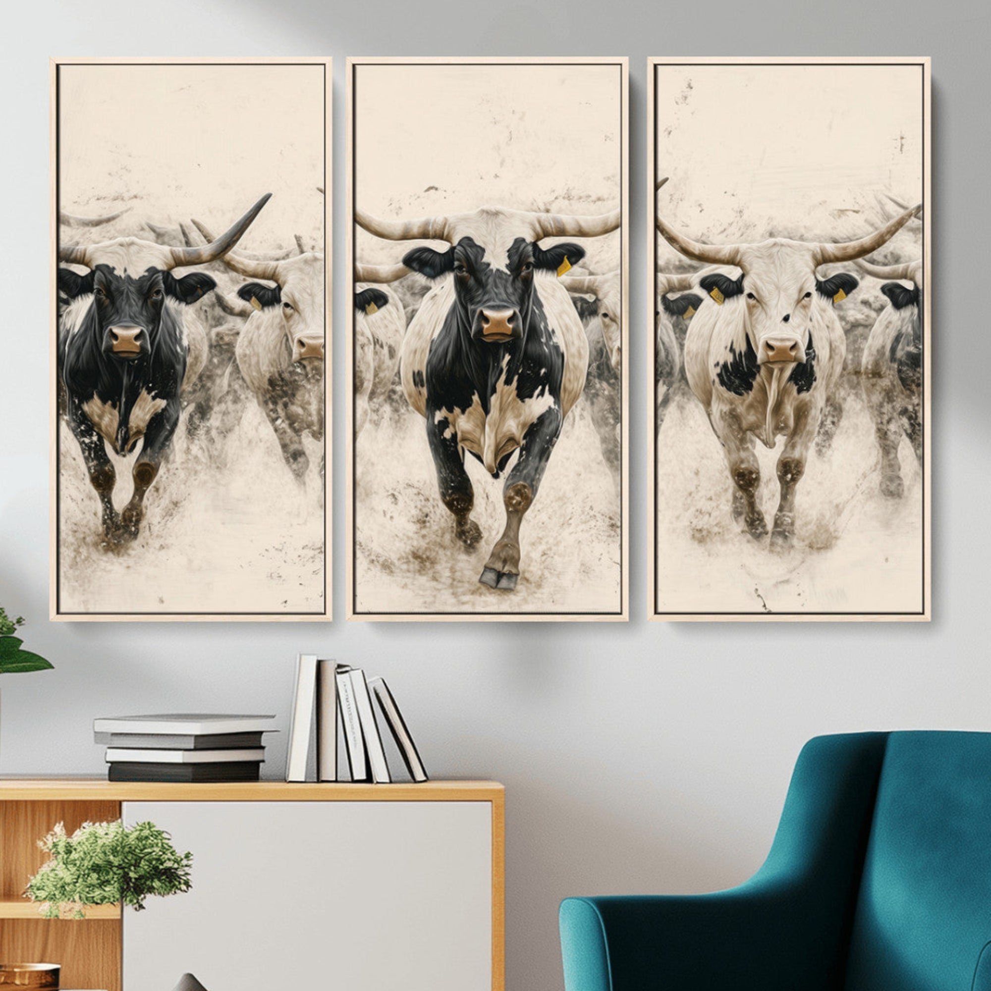 Canvas artwork of Texas Longhorn bulls walking in a dusty herd, ideal for rustic Western or country-style interior decor.