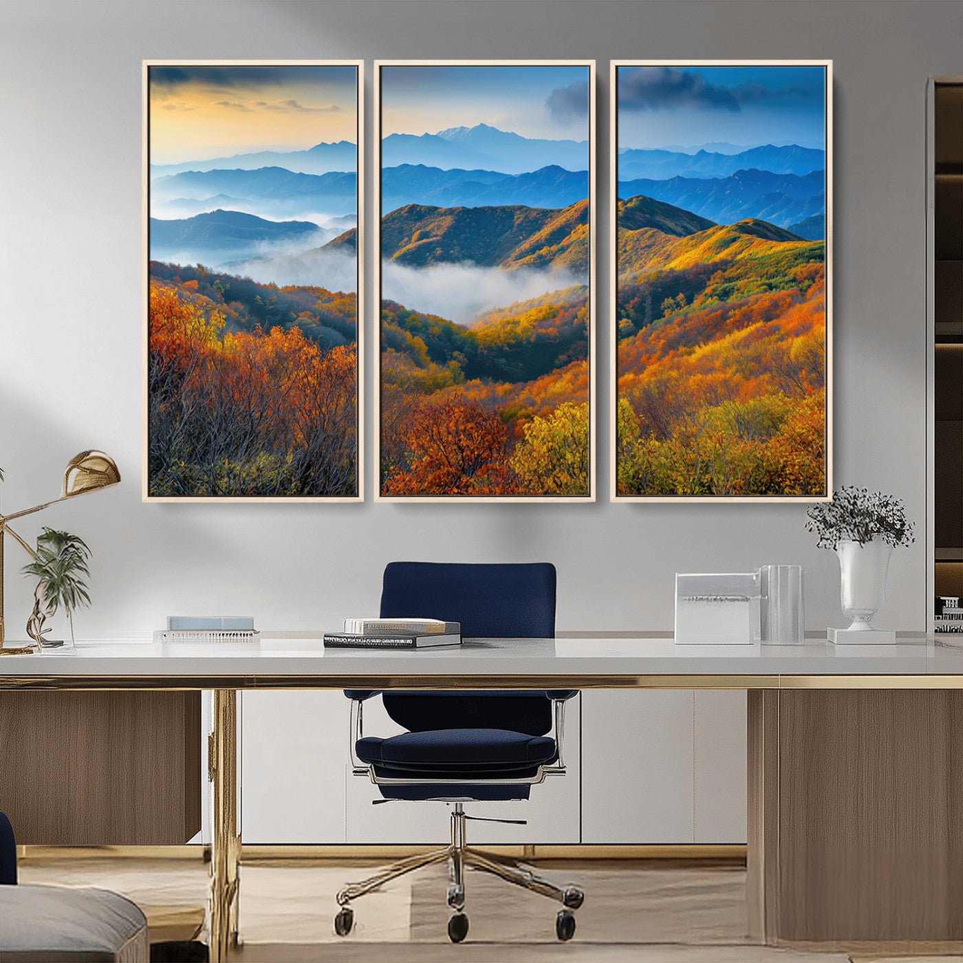Vibrant canvas of autumn mountains with colorful trees, layered blue ridges, and soft morning fog, ideal for bright nature-themed decor.