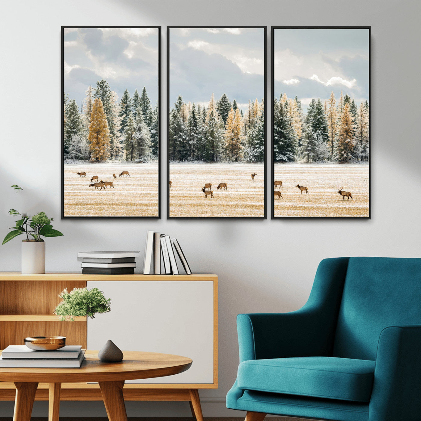Elk herd in a snowy field with golden pine trees and frosted evergreens, ideal for neutral rustic or cabin-style home decor.