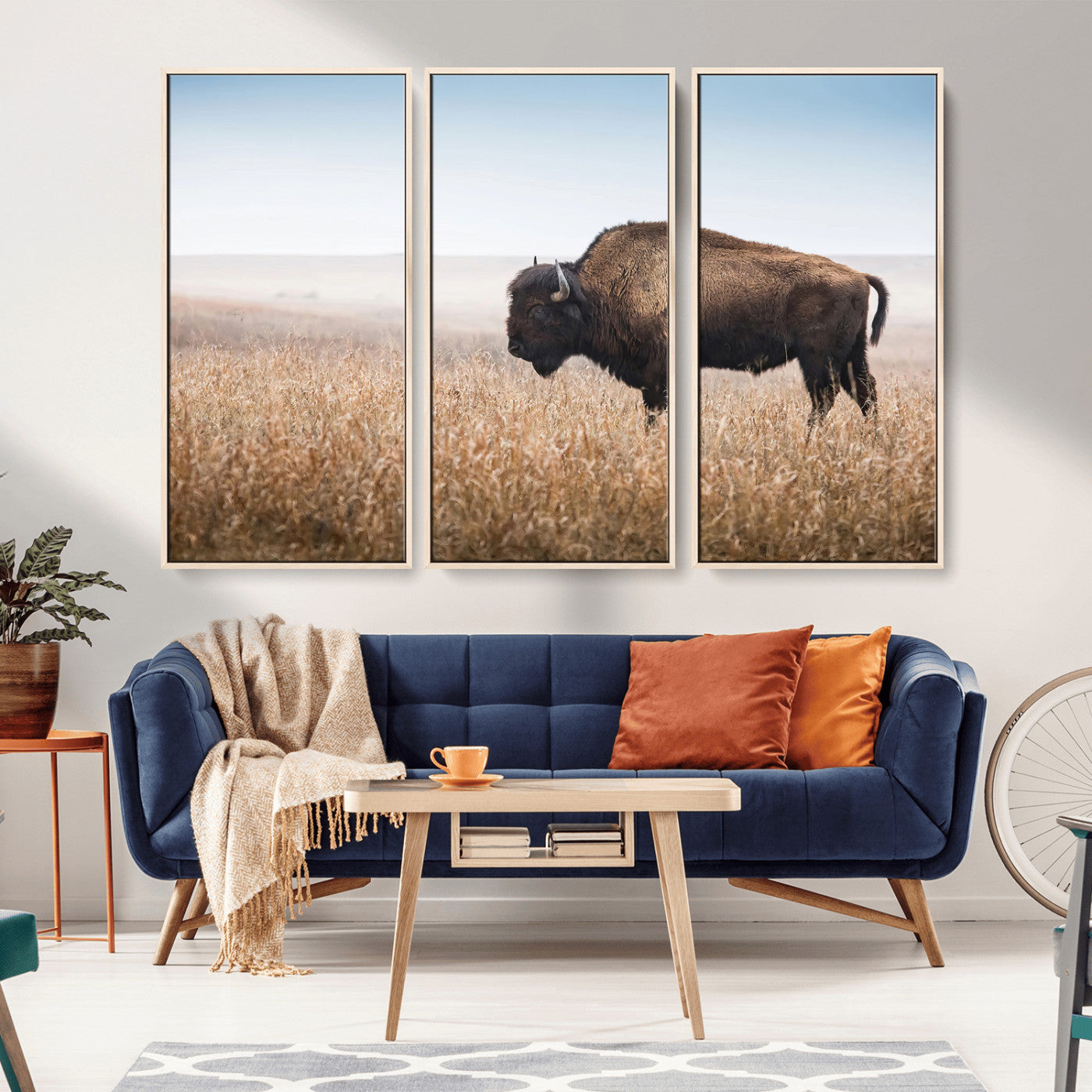 A solitary American bison stands in a dry grassland under soft skies, ideal for rustic or western-style home decor in warm neutral tones.