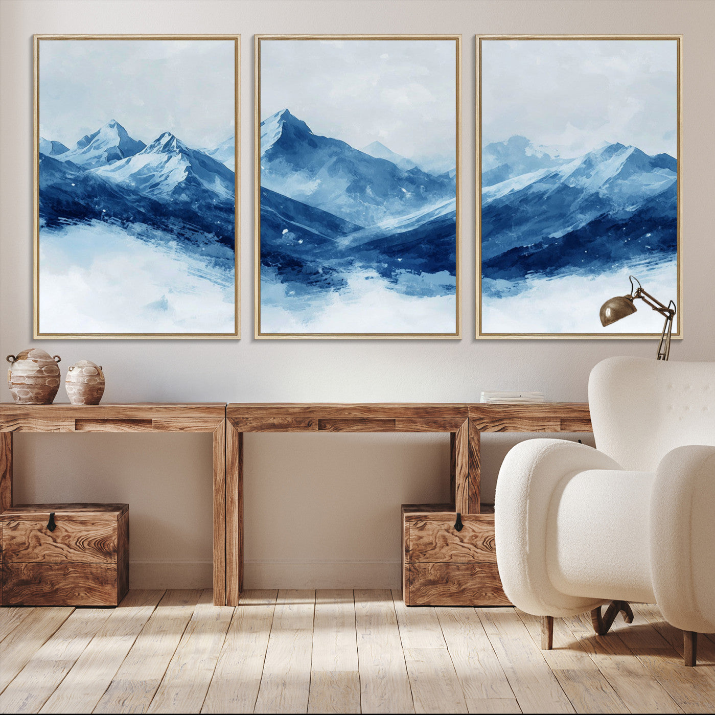 Peaceful watercolor-style painting of snowy blue mountains in soft tones, perfect for winter-themed or minimalist wall decor.