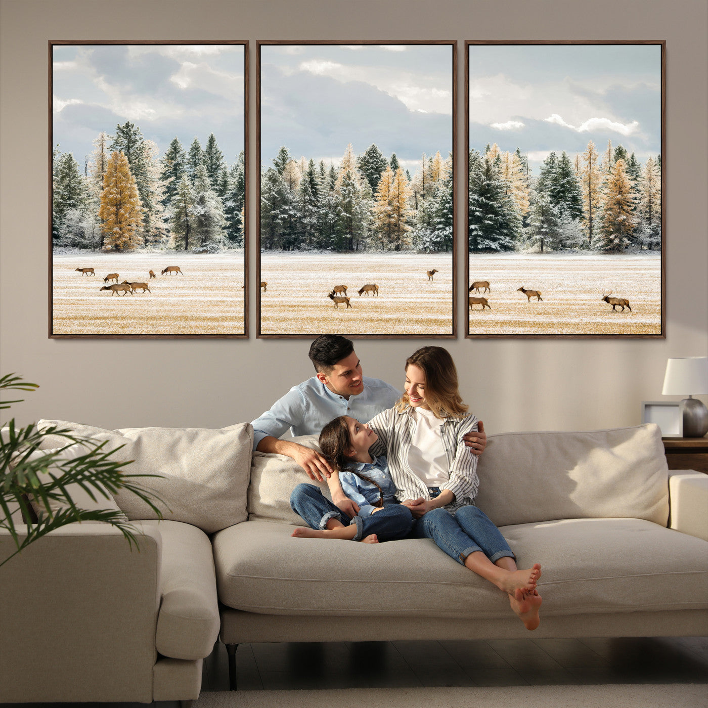 Elk herd in a snowy field with golden pine trees and frosted evergreens, ideal for neutral rustic or cabin-style home decor.