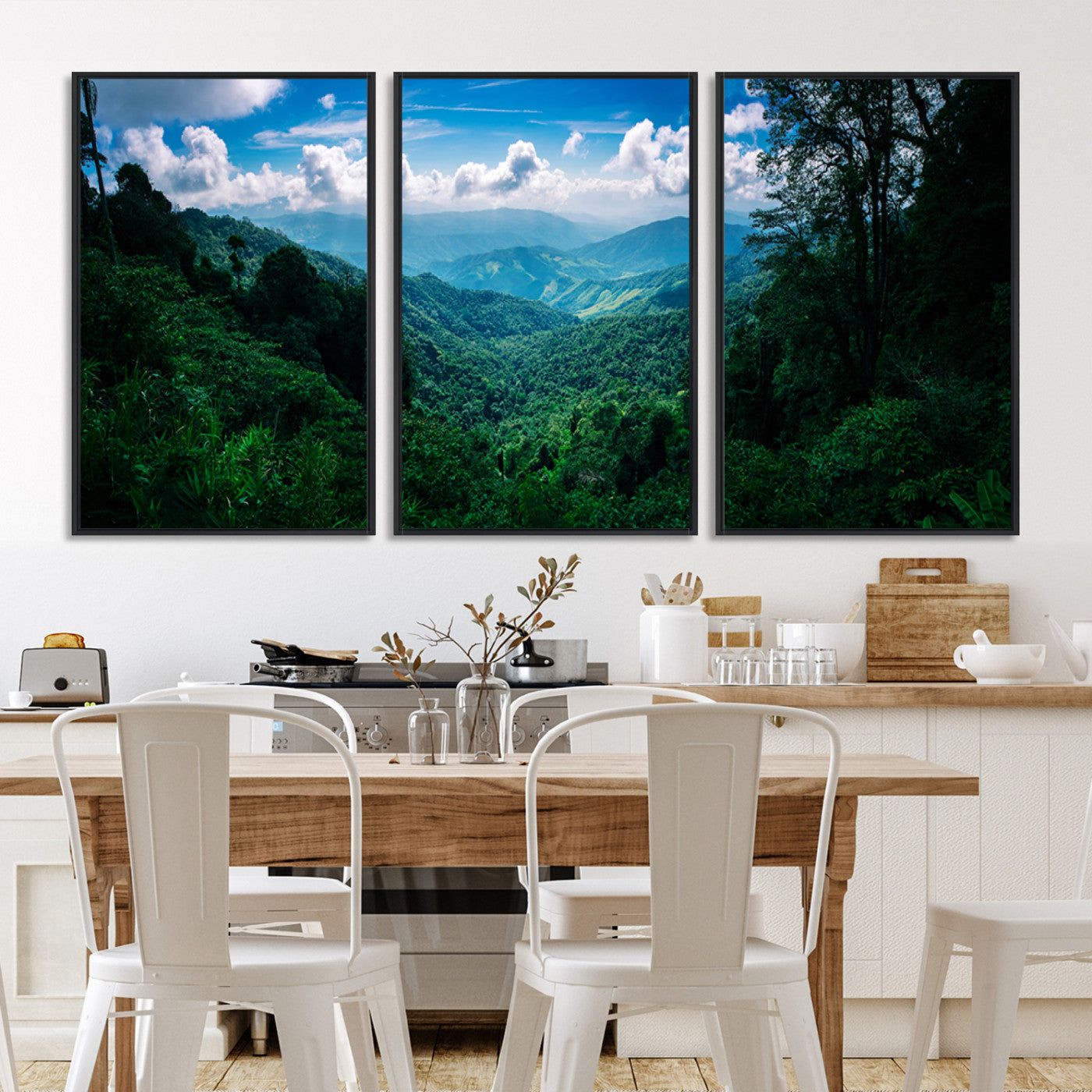 Canvas of a misty tropical jungle with vibrant greenery and layered blue mountains, ideal for exotic nature-themed wall décor.