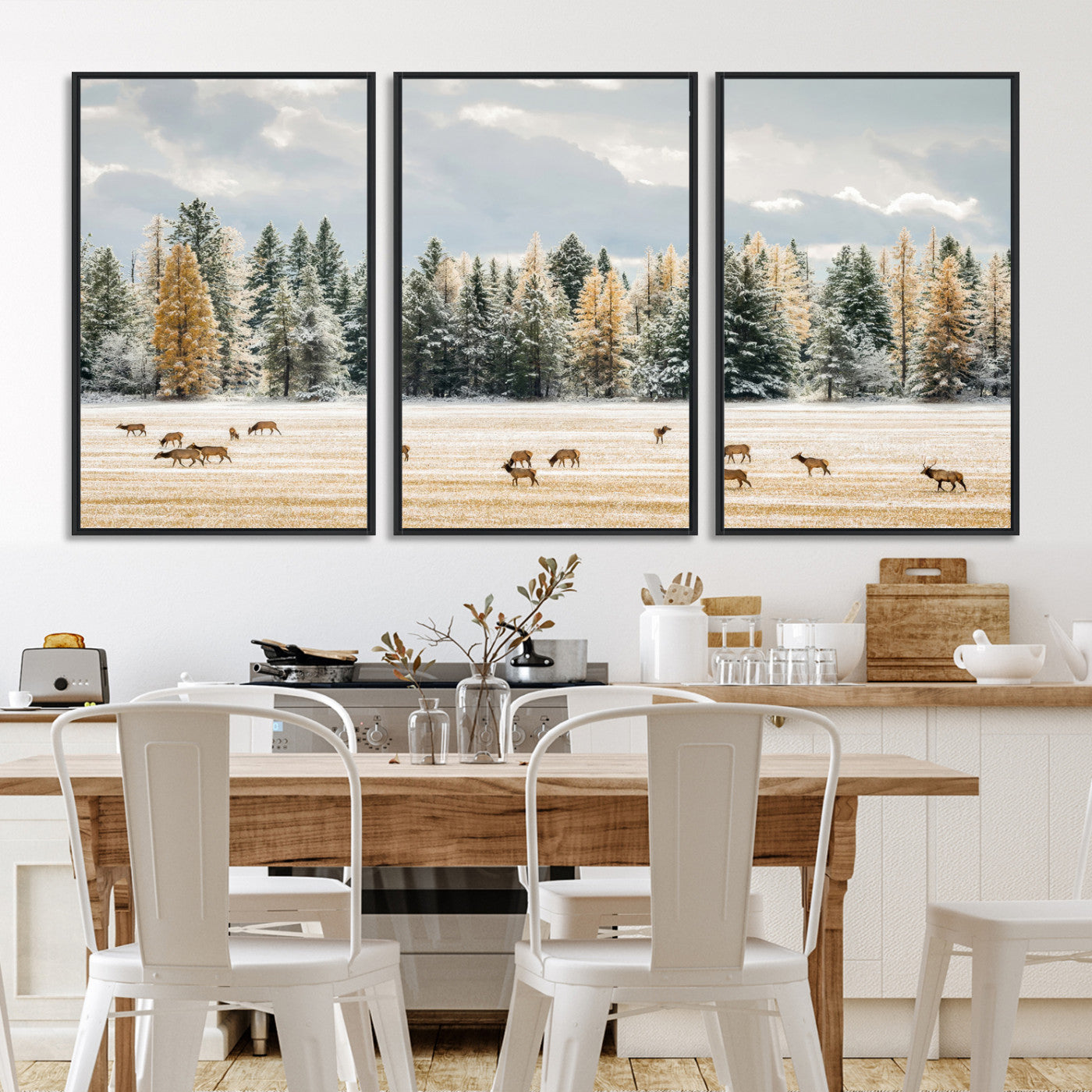 Elk herd in a snowy field with golden pine trees and frosted evergreens, ideal for neutral rustic or cabin-style home decor.
