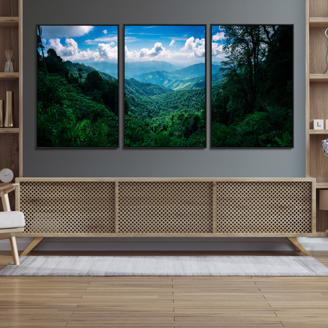 Canvas of a misty tropical jungle with vibrant greenery and layered blue mountains, ideal for exotic nature-themed wall décor.