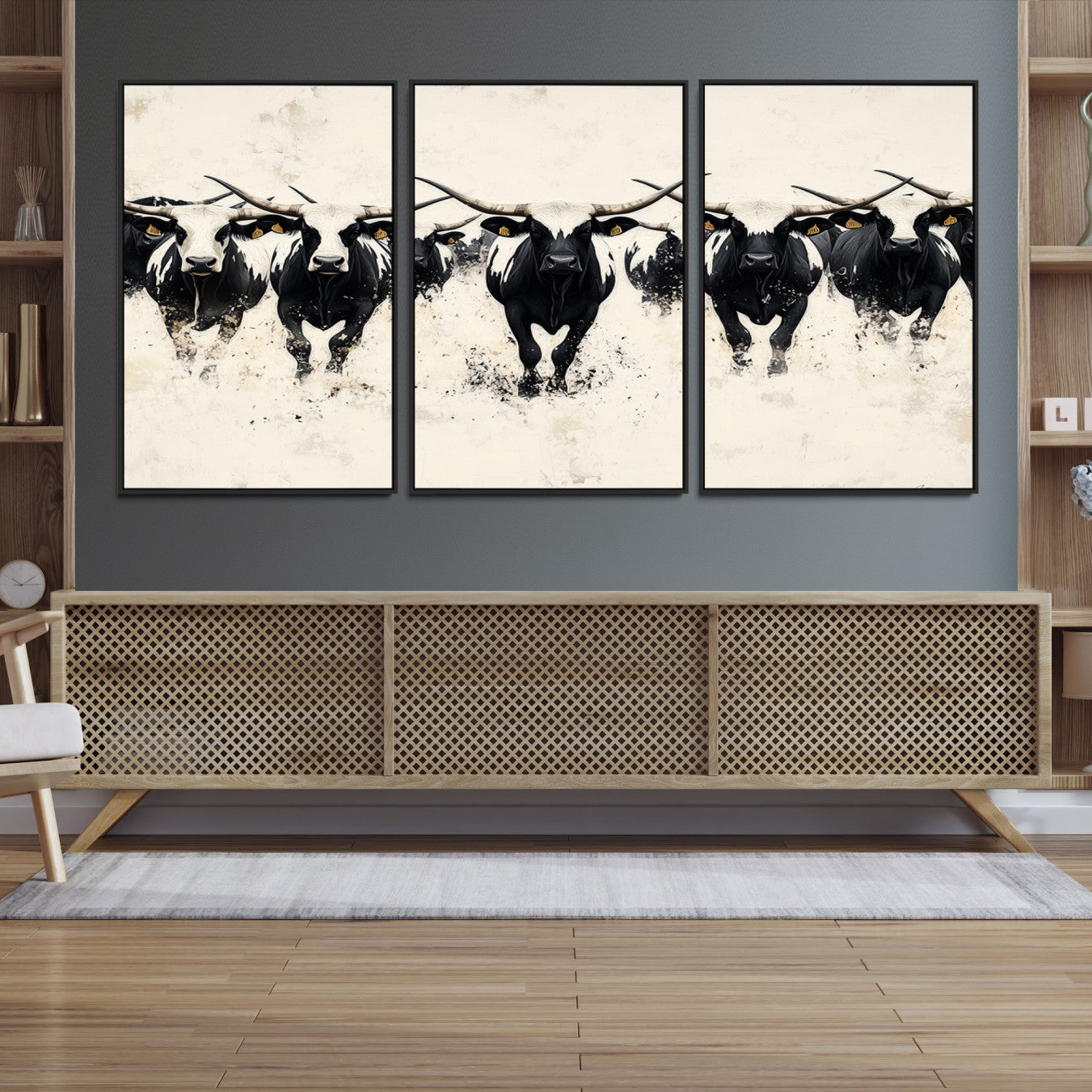 Canvas artwork of black and white Texas longhorns in a bold stampede over a minimalist background, ideal for rustic modern or Western-themed decor.