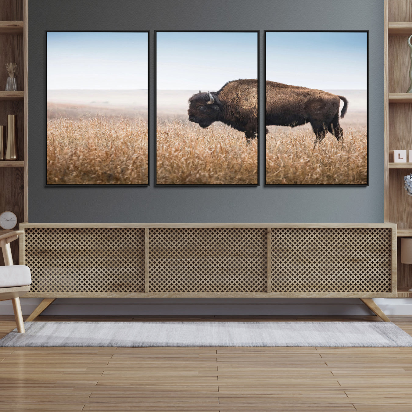A solitary American bison stands in a dry grassland under soft skies, ideal for rustic or western-style home decor in warm neutral tones.