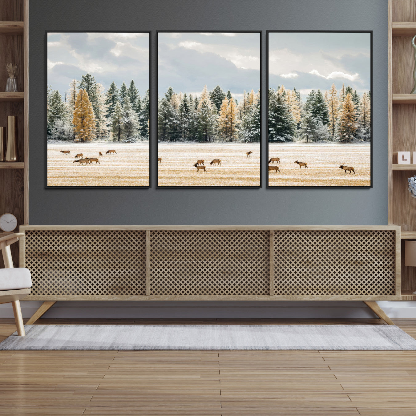 Elk herd in a snowy field with golden pine trees and frosted evergreens, ideal for neutral rustic or cabin-style home decor.