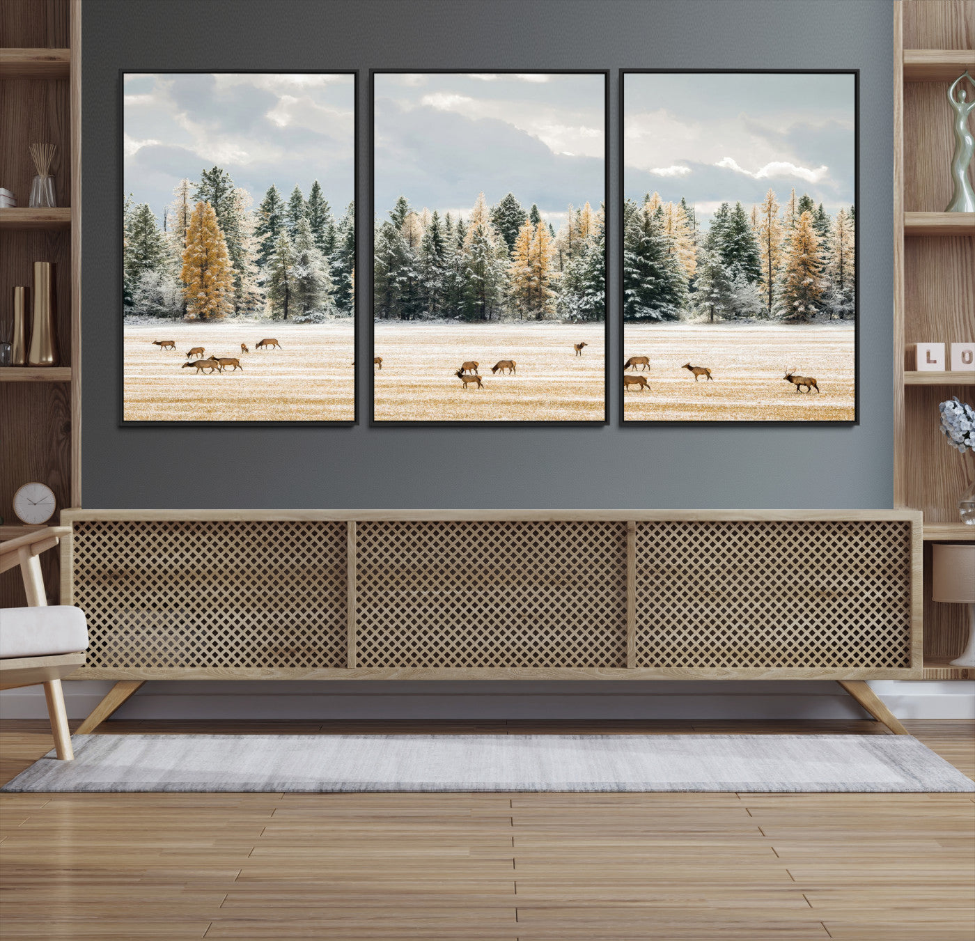Elk herd in a snowy field with golden pine trees and frosted evergreens, ideal for neutral rustic or cabin-style home decor.