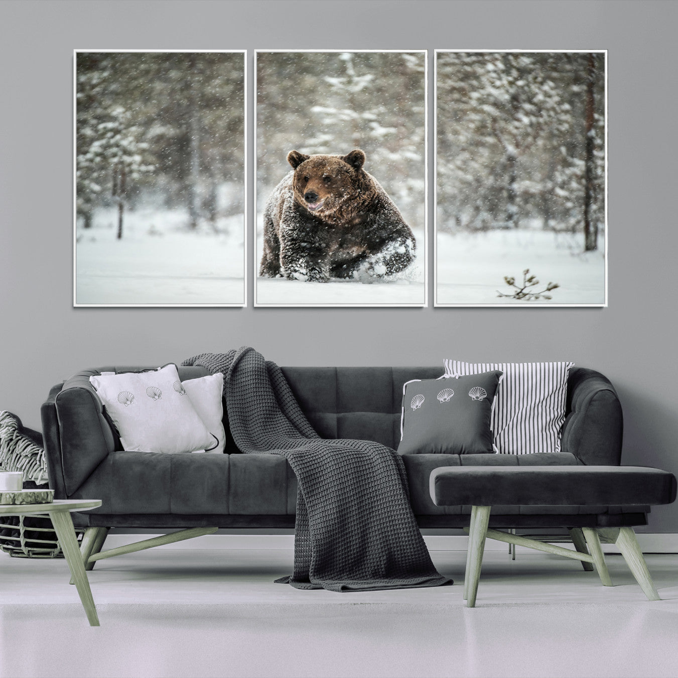 A majestic brown bear moves through a snowy forest landscape, surrounded by falling snowflakes, capturing the essence of wildlife in winter.