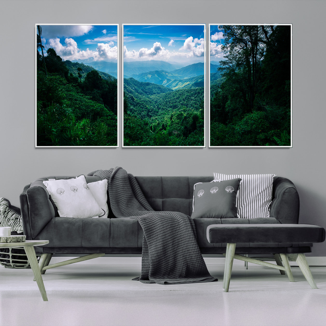 Canvas of a misty tropical jungle with vibrant greenery and layered blue mountains, ideal for exotic nature-themed wall décor.