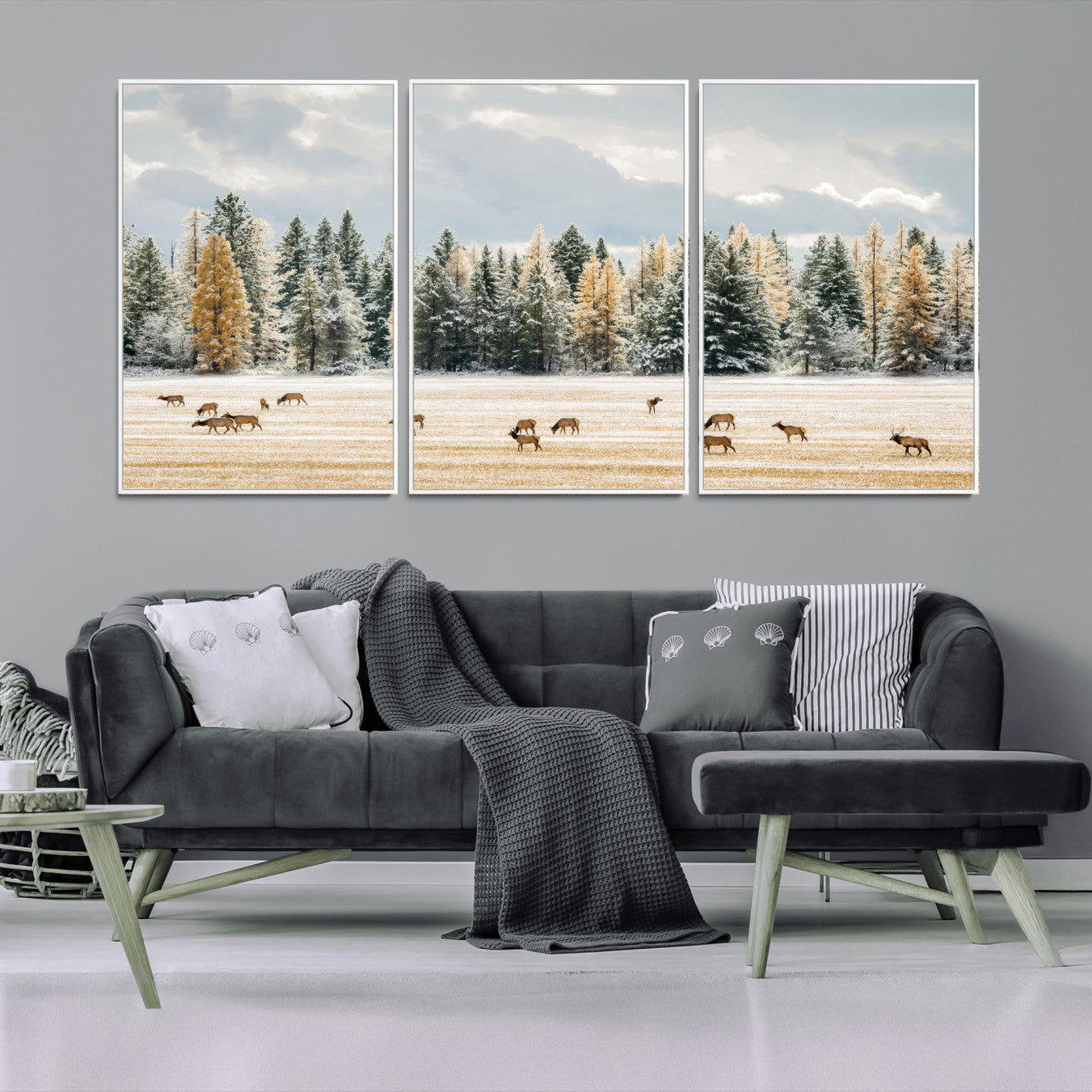 Elk herd in a snowy field with golden pine trees and frosted evergreens, ideal for neutral rustic or cabin-style home decor.