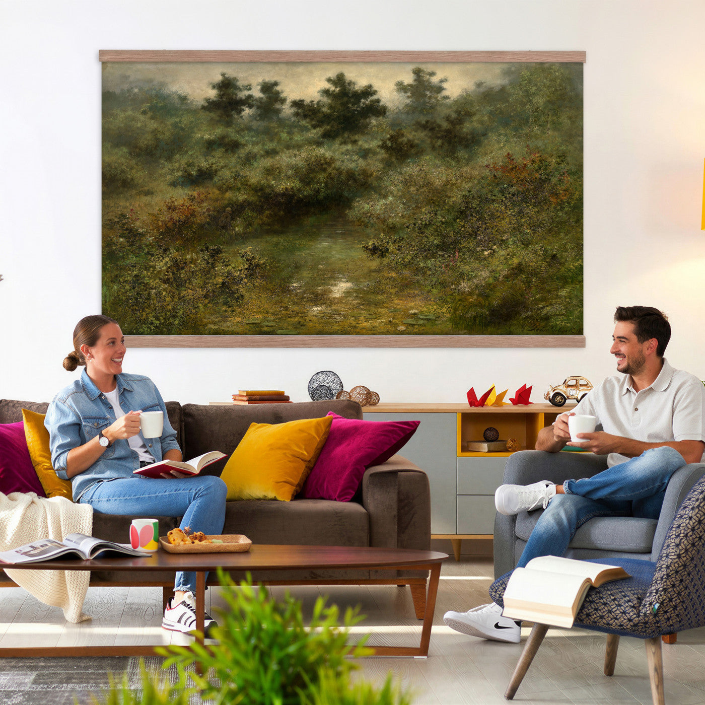 66880646-MGV-TP-30X20 - Barbizon oil painting tapestry wall hanging of "By the Brook" by Xavier De Cock, showing a shaded brook winding through dense woodland, with a small hidden figure resting among the trees in dark layered forest greens with warm brown earth and pale water light. Extra large wall art, made in the USA.