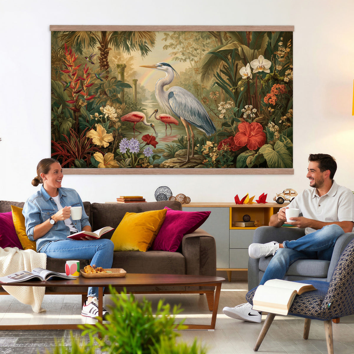 20081183-MGV-TP-30X20 - Botanical botanical illustration tapestry wall hanging of "Great Blue Heron in the Jungle", showing a great blue heron standing among hibiscus blooms, palm fronds and dense tropical foliage in deep jungle greens with red hibiscus and soft blue heron plumage. Extra large wall art, made in the USA.