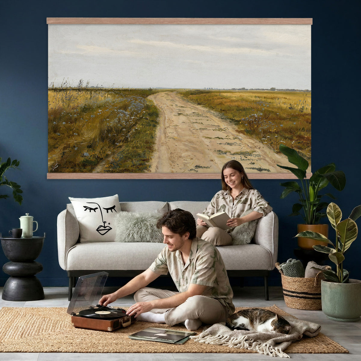93198256-MGV-TP-30X20 - Realism oil painting tapestry wall hanging of "Field Track" by Jozef Chelmonski, showing a rutted dirt track cutting through open meadow grass toward a low horizon and a wide country sky in warm earth track tones with green meadow grass under a broad sky. Extra large wall art, made in the USA.