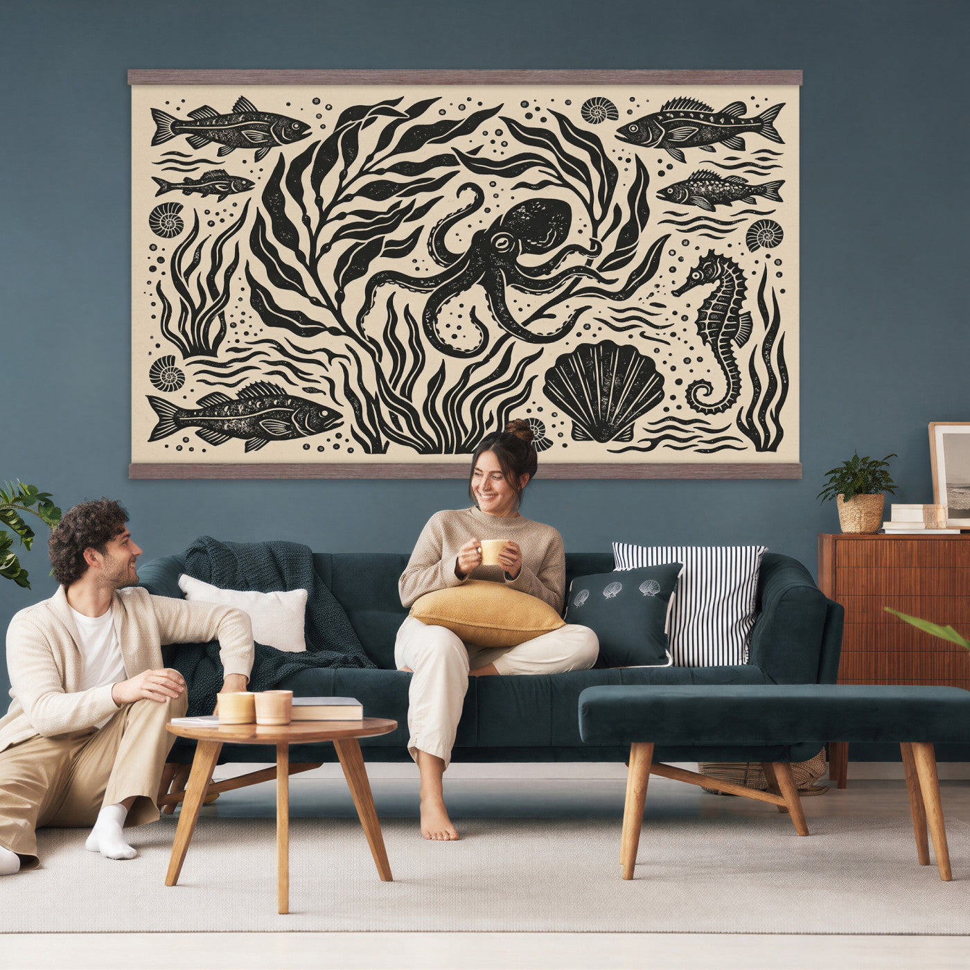 75988079-MGV-TP-30X20 - Folk Art linocut print tapestry wall hanging of "Ocean Life Panel", showing an octopus, seahorses, shells and curling waves cut into bold black and white folk art shapes in bold black linocut shapes on a cream ground. Extra large wall art, made in the USA.