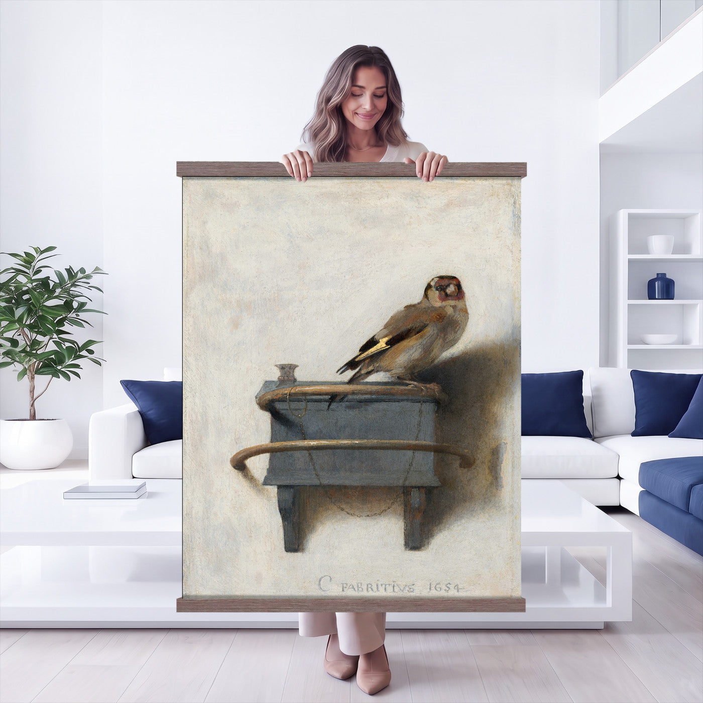 88453247-MGV-TP-24X36 - Dutch Golden Age oil painting tapestry wall hanging of "The Goldfinch" by Carel Fabritius, showing a small goldfinch chained to its feeder box, painted against a pale sunlit wall in famous trompe l'oeil detail in warm gold and black bird plumage against a pale cream sunlit wall. Extra large wall art, made in the USA.